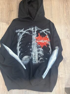 Loiter Black Graphic Hoodie with Ribcage Print and Red Accent